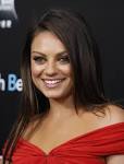 Friends with Benefits Premiere. Cast member Mila Kunis smiles as she arrives ... - 133471-friends-with-benefits-premiere
