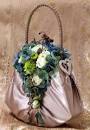 http://www.flowersbytina.com.au/shoppingcart/product_images/q/712/Handbag-with-hydrangea-and-white-roseswm__58724_zoom.jpg