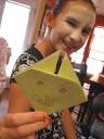 My oldest niece, Isabelle, led the crowd in an origami lesson. - caitlyns-japanese-birthday-partyissyorigami1