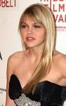http://upload.wikimedia.org/wikipedia/commons/c/c4/Aimee_Teegarden_at_the_2008_Tribeca_Film_Festival.JPG