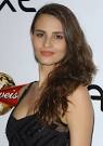 http://www4.pictures.zimbio.com/bg/Fernanda%2BTavares%2B2007%2BSports%2BIllustrated%2BSwimsuit%2Bc8WOt9Y7lbdl.jpg
