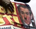 with a Hitler mustache;