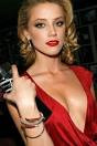 AMBER HEARD - Nadine Caridi Belfort. ROBERT DE NIRO - Max Belfort