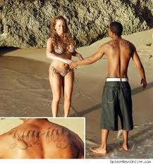 nick cannon tattoos
