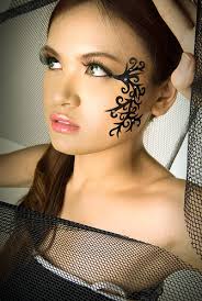girl face tattoo