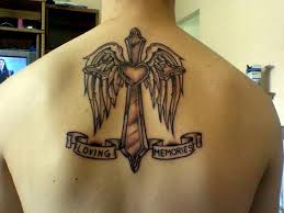 cross tattoo with angel wings