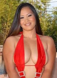 Asian Teen Bouncing On Big Ball With Big Boobs.