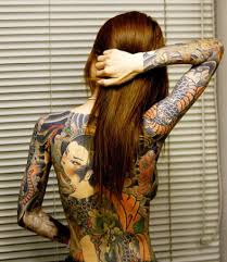 http://t1.gstatic.com/images?q=tbn:ckednfywR8JVqM:http://i714.photobucket.com/albums/ww141/tygc/japanese-tattoo-01.jpg