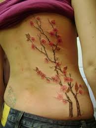 cherry blossom tattoo on side
