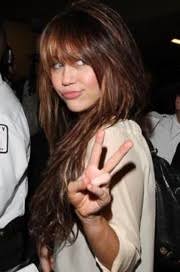 http://t1.gstatic.com/images?q=tbn:v4ZRitQ3y1_wZM:http://www.nationalledger.com/artman/uploads/miley_peace.jpg
