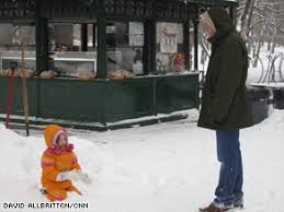 A girl plays in the snow