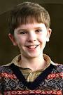 Charlie Bucket is the only of the five children exploring the factory to not ... - 13868598026798l