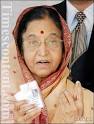President of India Mrs Pratibha Patil displays her voter identity card ... - Mrs Pratibha Patil