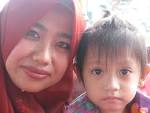 Above: Wan Suraya with baby Farisya. To be continued… - img_0691