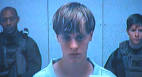 Charleston church shooting suspect charged with 9 counts of murder.