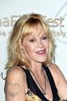 MELANIE GRIFFITH Covers Up Antonio Banderas Tattoo After Split