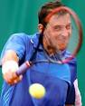 Andrei Pavel of Romania returns a backhand to Frank Dancevic of Canada ... - sp4