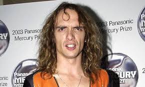 Justin Hawkins of the Darkness in 2003. Photograph: Yui Mok/PA. The Darkness have reunited after a five-year gap to play the Download festival at Donington ... - Justin-Hawkins-of-the-Dar-007