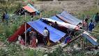 Desperate Nepalese sleep in open, seek help as aftershocks spread.