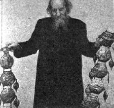 Father Crespi put a heavy copper plaque in front of the camera. Fig. 12. This is Father Carlo Crespi,. who collects and guards an incredible treasure of ... - gold_g12