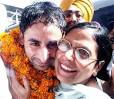 Hockey star Prabhjot Singh is hugged by his mother at the Amritsar Railway ... - sp10