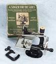 Meeker's www.AntiqBuyer.com Past Sales Archive Antique Singer Toy