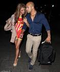 TOWIE star Chloe Sims cuddles up to a mystery man... as she copes