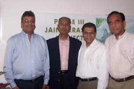 JSGA Offciers Paresh Shah, Deepak Shah and Anil Shah with Quantum National Bank Chairman Dr.Neel Neelagaru - JainTemple3
