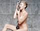 Miley Cyrus Naked, Crying in "Wrecking Ball" Video: Watch Now