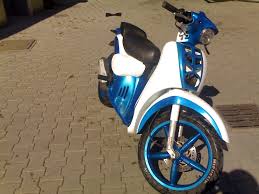 Scooter da tuning? Eccolo! Images?q=tbn:ANd9GcR4VB2LhuceToRXUX02z8RLpYJ0rpsX6dFPXd2jdZffNw5l6v-s0w&t=1