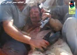 moammar gaddafi shot and killed Images?q=tbn:ANd9GcRBIKy7cut-yc2oVsEr-W06gZEPB1QU6b4PRZIESCWyLPOvfvXU