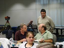 Jeremy Smith talks with Gary Friedman while Bruce Horrocks (HPCC Editor) looks on - DSC00933