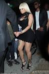 Blac Chyna squeezes her curvaceous figure into daring LBD.as ex.
