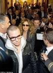 Jennifer Lopez looks thrilled as she is mobbed by fans as she