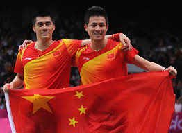 Yun Cai and Haifeng Fu (L) of China celebrate victory against Mathias Boe and Carsten Mogensen of Denmark in their Men\u0026#39;s Doubles Badminton Gold Medal match ... - Yun+Cai+Olympics+Day+9+Badminton+RCn2Kpd1BJ8l