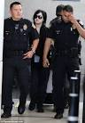 Demi Lovato arrives in Los Angeles under heavy police protection