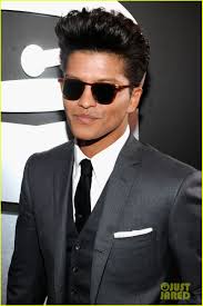 About this photo set: Bruno Mars walks the red carpet at the 2012 Grammy Awards held at Staples Center on Sunday (February 12) in Los Angeles. - bruno-mars-grammys-04
