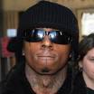 The rapper, whose real name is Dwayne Carter, faces one count of criminal ... - lilwaynecourt_200