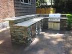 outdoor-kitchen-with-bar-top- ...