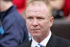 Alex McLeish looks on as new striker Christian Benitez, signed for a club ... - _46214264_mcleish_ap766