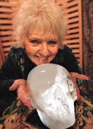 JoAnn Parks holds a crystal skull named Max at Pilgrim&#39;s Way Bookstore - mysterious-crystal-skull-21345473