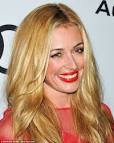 Emmy Awards 2012: Cat Deeley flashes a smile, only to reveal