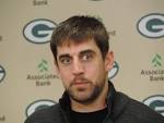 Rodgers day started with pain in the neck