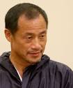 DENIES CRIMES: Cheng Qi 'Chris' Wang at a previous court appearance. - 6408425
