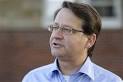 Gary Peters (D-MI) introduced a bill that would require publicly-traded ... - 10189594-large