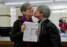 Gay couples line up for marriage licenses - Spokesman Mobile - Dec ...