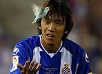 Espanyol's Shunsuke Nakamura watches a bird fly during the match against ... - bs18