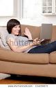 Happy Pregnant Woman Talking On Internet Video Chat Stock Photo