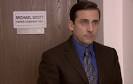 The CEO himself, Michael Scott, poses outside his 165-square-foot office, ...