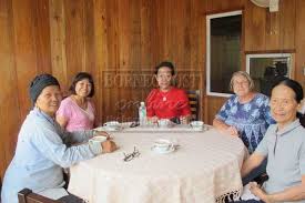 TEA BREAK: Having afternoon tea with Marilyn, sister of popular Kelabit doctor Dr Roland Mattu whose children are working in KL. - T07465